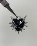 Black claw heart charm
