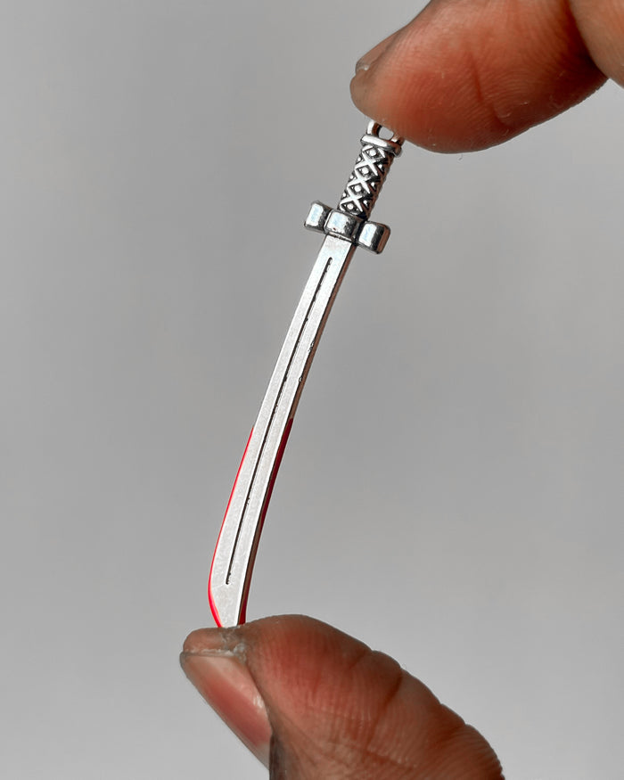 Bloody sword charm