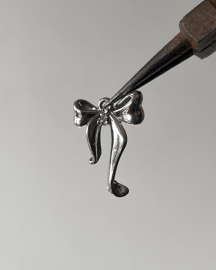 Bow Stone charm