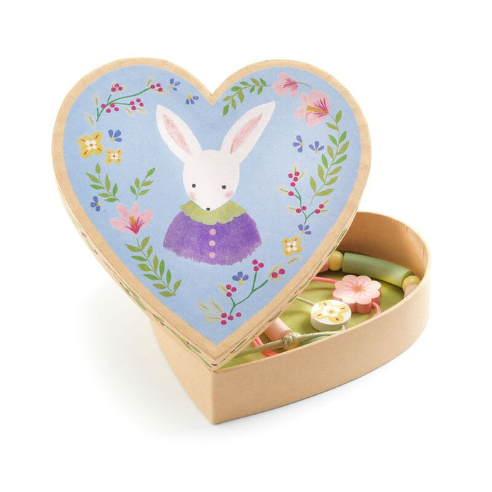 Heart-shaped box with a rabbit illustration on a white background