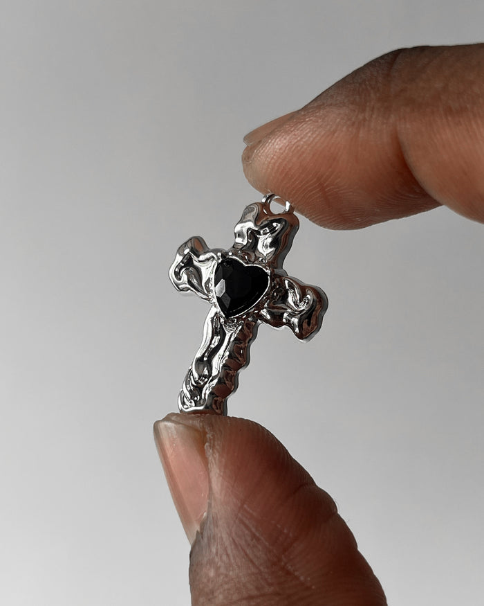 Melting black cross