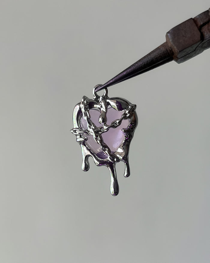 Melting purple heart charm