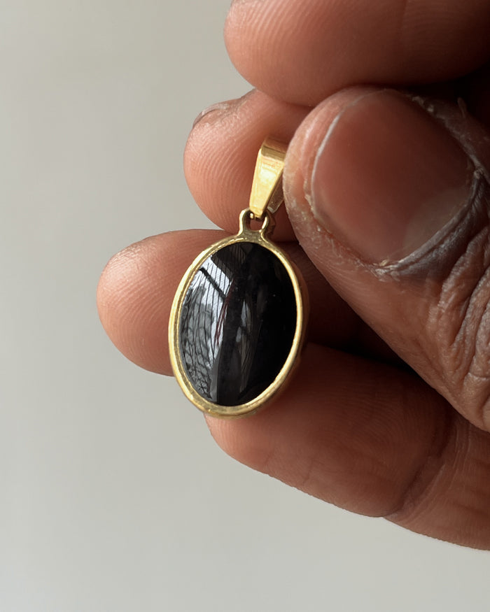 Oval Gold charm