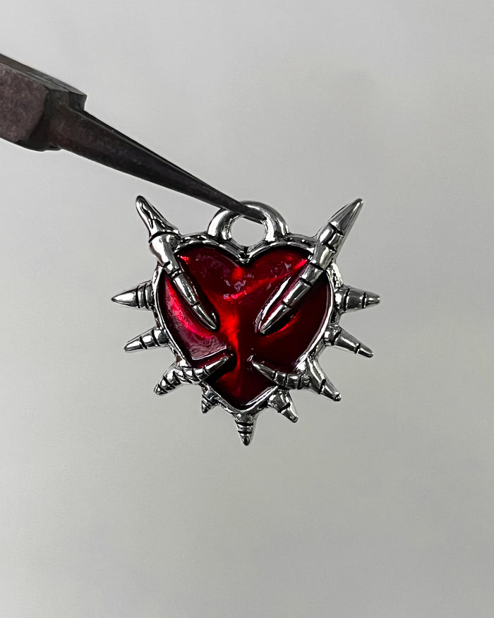 Red claw heart charm