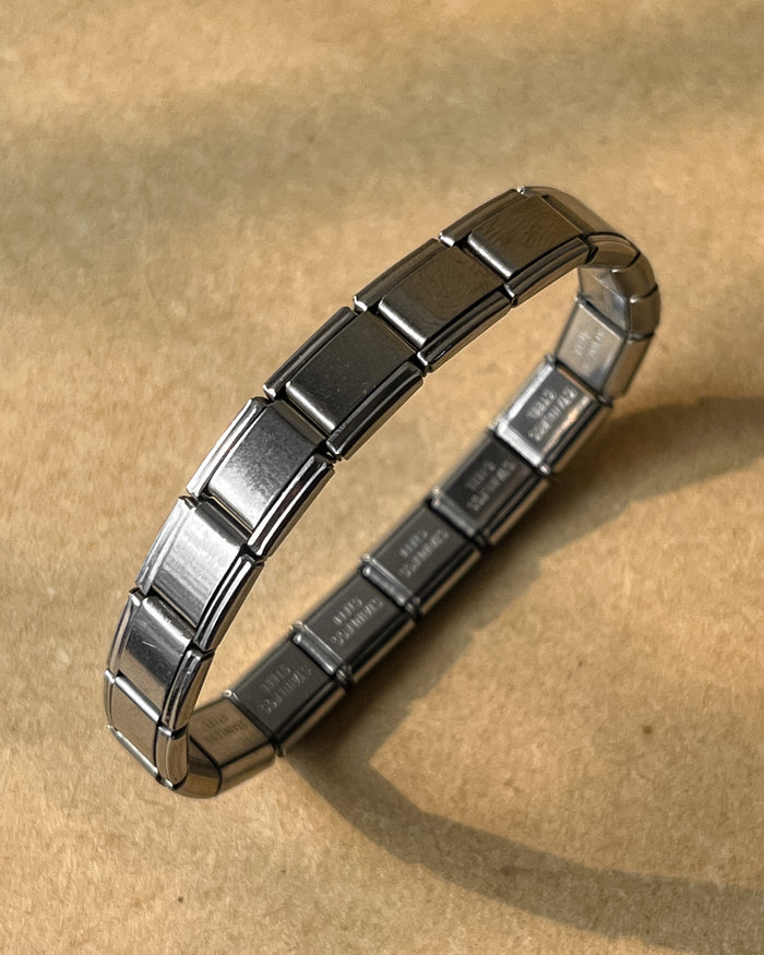 Simple Italian charm bracelet (sasta quality but does the job) yeah it’s stainless steel