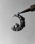 Skull moon pendant