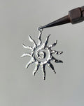 Sun charm