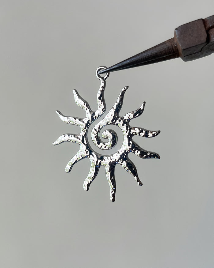 Sun charm