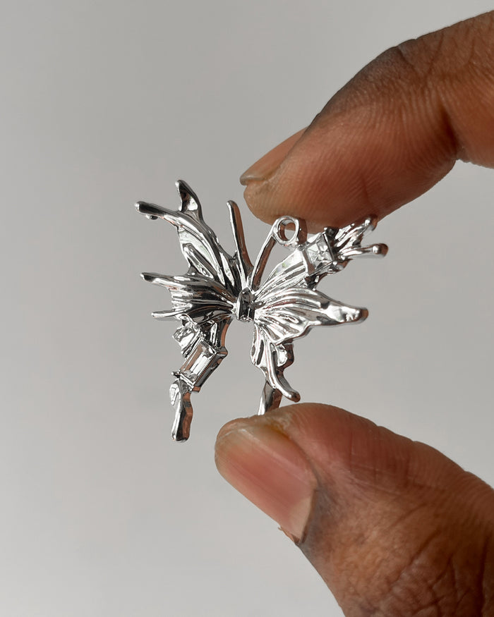 White butterfly charm