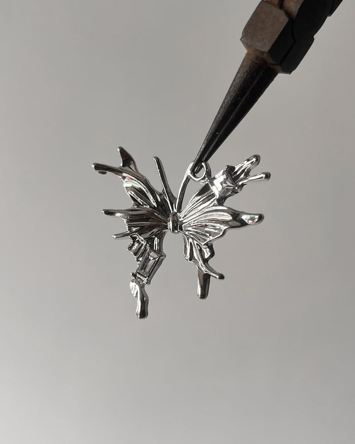 White butterfly charm