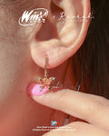 Shine with Stella's Enchantix magic wearing the Winx Club® Stella Enchantix Fairy Wings Earrings. Officially licensed earrings inspired by her iconic fairy wings. A magical accessory for every Winx Club fan.